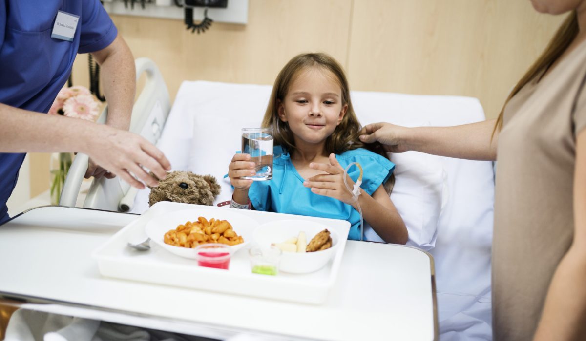 Young Caucasian girl is staying at the hospital